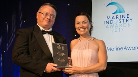 Lucy Hunt receiving an award