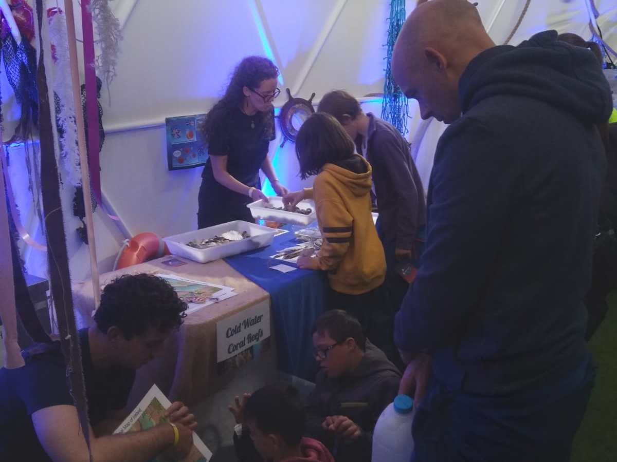 a group of people standing in a room