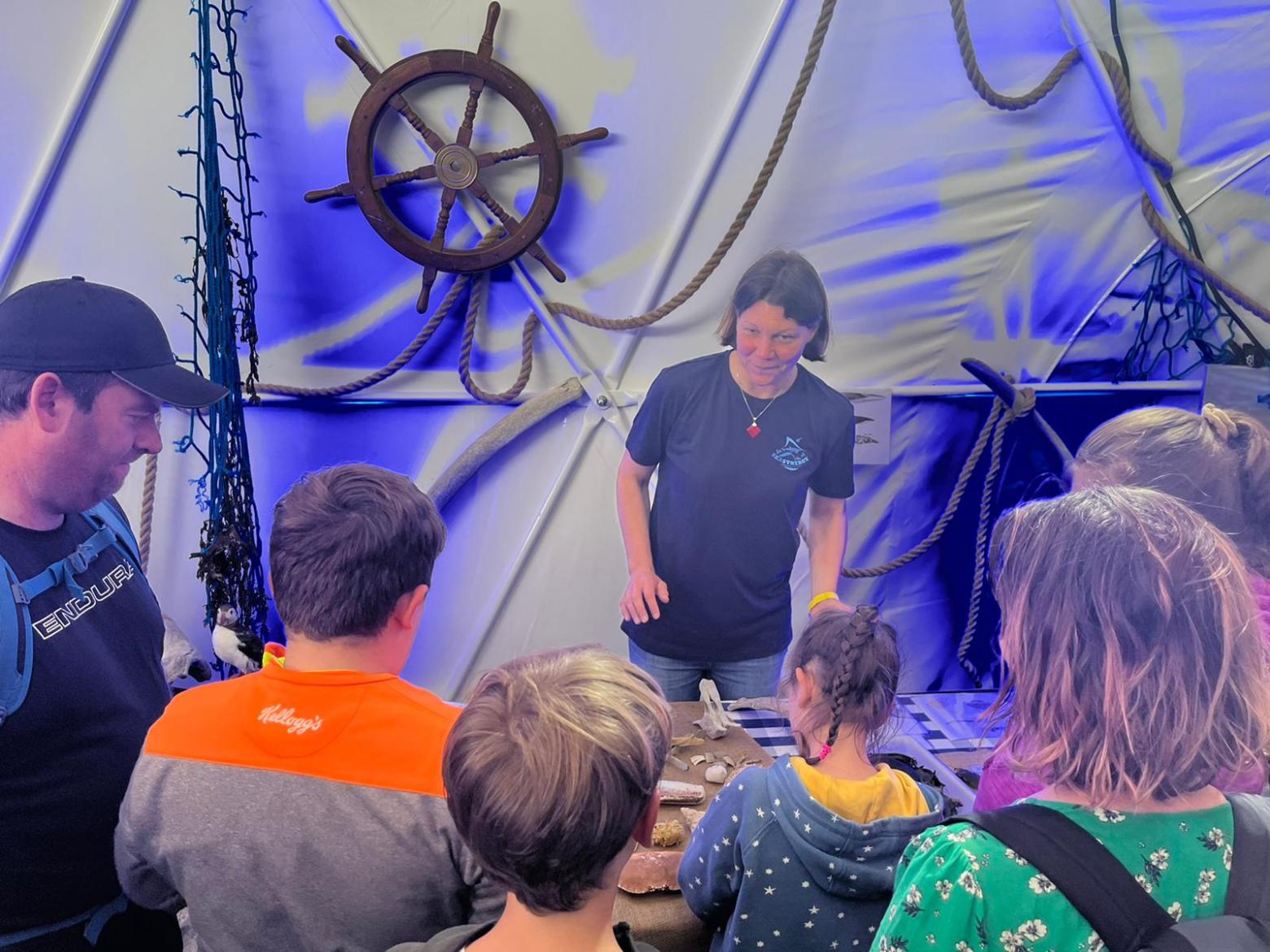 a group of people standing on a stage